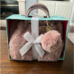 Isaac Mizrahi New York, brand new faux fur purse with keychain.